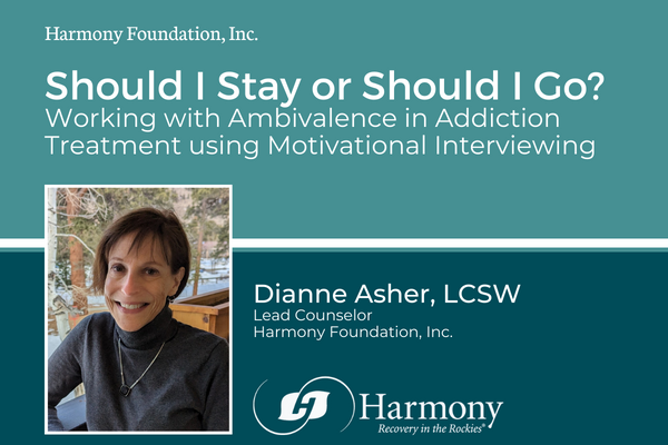 Blue and white text with image of woman smiling outside of Harmony Recovery, our alcohol rehab center in Colorado